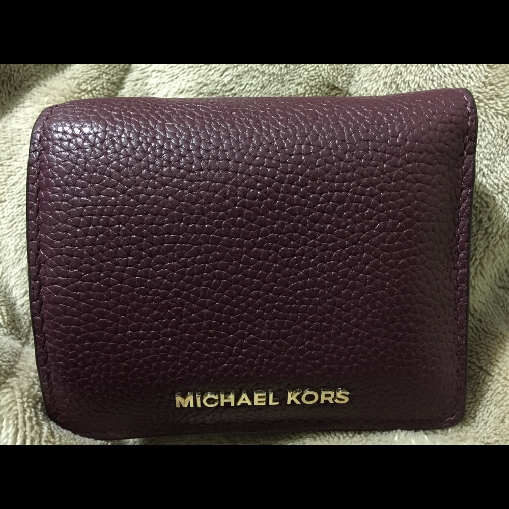 MK pebble leather wallet